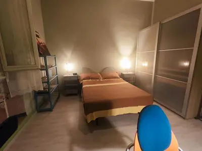 Letto o letti in una camera di Casa Lori - ai piedi di piazzale Michelangelo