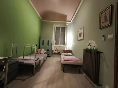 Letto o letti in una camera di Casa Lori - ai piedi di piazzale Michelangelo