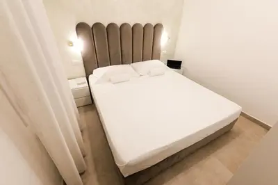 Letto o letti in una camera di MagicFlo Santa Croce Appartamento