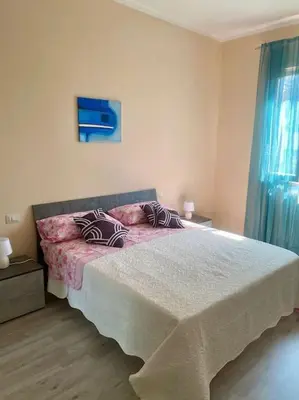 Letto o letti in una camera di Casa Margherita