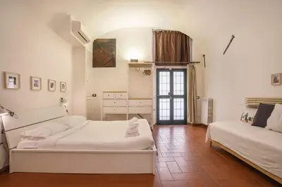 Letto o letti in una camera di L'Antica Concia - Sweet Dreams in Florence