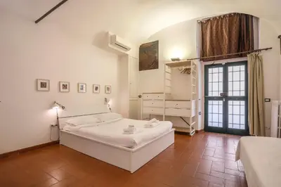 Letto o letti in una camera di L'Antica Concia - Sweet Dreams in Florence