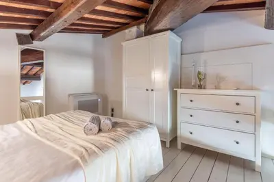 Letto o letti in una camera di Casa Rondinelli