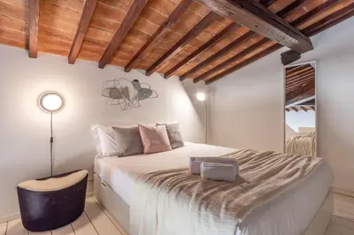 Letto o letti in una camera di Casa Rondinelli