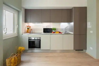 Cucina o angolo cottura di The Florentine Apartment - Flo Apartments