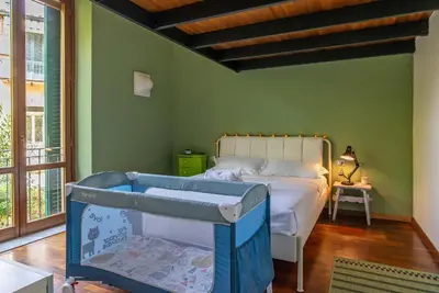 Letto o letti in una camera di Dimora 28 con Posto Auto Privato