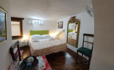 Letto o letti in una camera di Appartamento Girasole