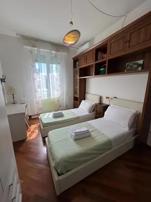 Letto o letti in una camera di Lumà Apartment - Careggi