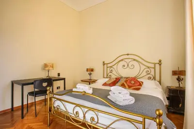 Letto o letti in una camera di Oltrarno Tasso Apartment in Florence