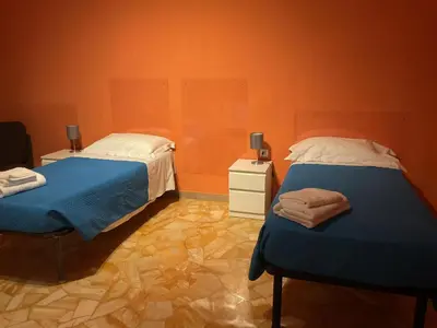 Letto o letti in una camera di Oro B22