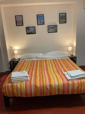 Letto o letti in una camera di Oro A12