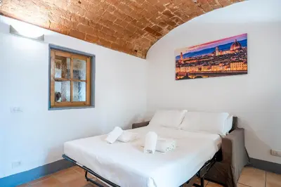 Letto o letti in una camera di Central Station Apartment with Garden