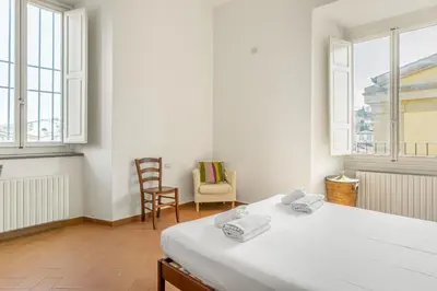 Letto o letti in una camera di GuestHost - The Lions' Apartment in the Historic Centre x8