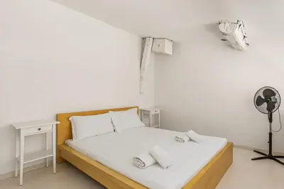 Letto o letti in una camera di GuestHost - The Lions' Apartment in the Historic Centre x8
