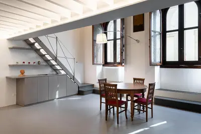 Area soggiorno di UNYCA - Luxury Duomo Loft Florence