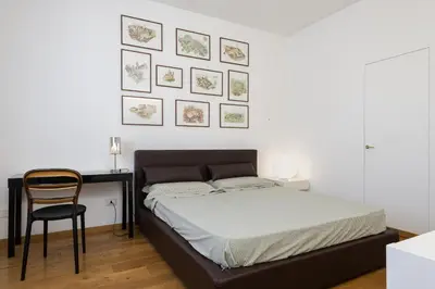 Letto o letti in una camera di UNYCA - Florence Modern Apartment