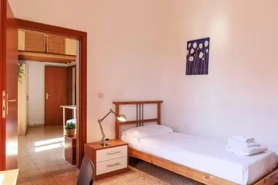 Letto o letti in una camera di Faenza Huge Apartment