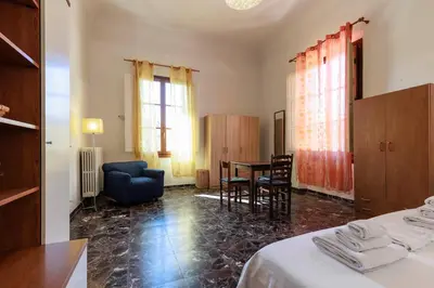 Letto o letti in una camera di Faenza Huge Apartment