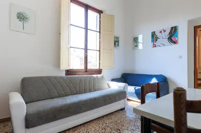 Area soggiorno di Faenza Huge Apartment