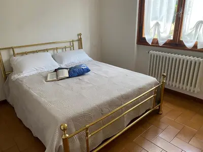 Letto o letti in una camera di Appartamento Magnolia