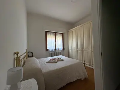 Letto o letti in una camera di Appartamento Magnolia