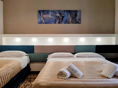 Letto o letti in una camera di Residenza San Lorenzo Firenze