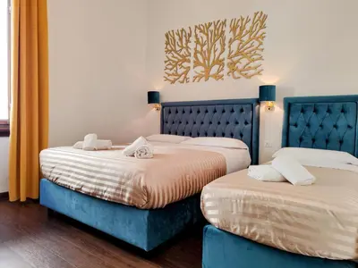 Letto o letti in una camera di Residenza San Lorenzo Firenze