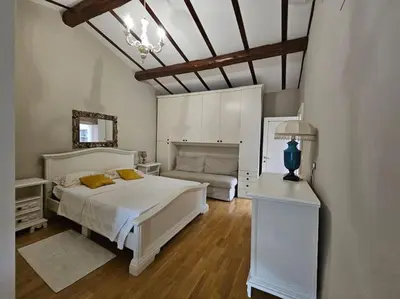 Letto o letti in una camera di Casa Flavia