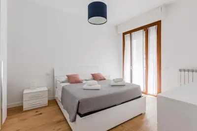 Letto o letti in una camera di GuestHost - Novella Fiorentina - San Jacopino Apartment