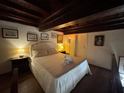Letto o letti in una camera di Suite Brunelleschi Florence - 14th century suite just 120 steps from Cathedral - Intero appartamento