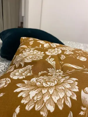 Letto o letti in una camera di Morgagni Suites- Elegante bilocale con tram T1 sotto casa