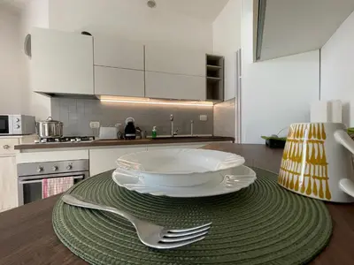 Cucina o angolo cottura di Morgagni Suites- Elegante bilocale con tram T1 sotto casa