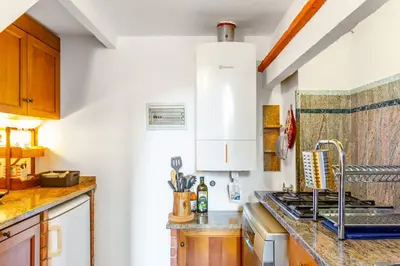 Cucina o angolo cottura di GuestHost - Renaissance Romance - Florence Gem Apartment