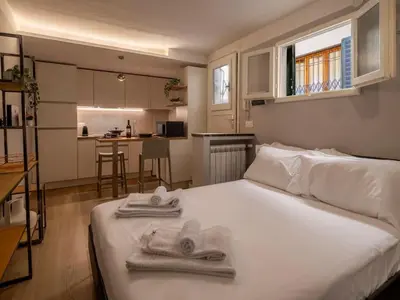 Letto o letti in una camera di Tuscan Tempo Elegant Escape near PonteVecchio