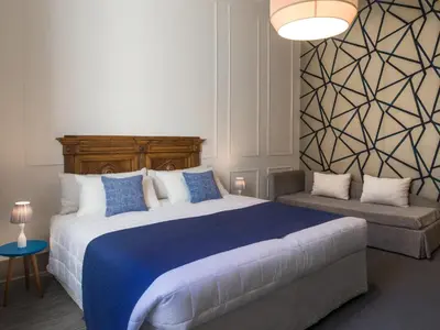 Letto o letti in una camera di Alfieri9