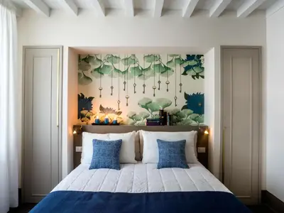 Letto o letti in una camera di Alfieri9