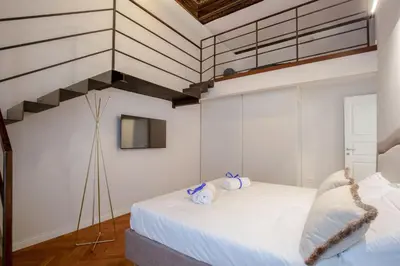 Letto o letti in una camera di Servi Deluxe Apartament