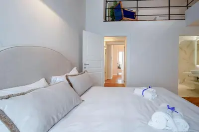 Letto o letti in una camera di Servi Deluxe Apartament