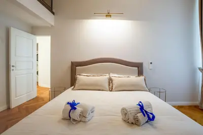Letto o letti in una camera di Servi Deluxe Apartament