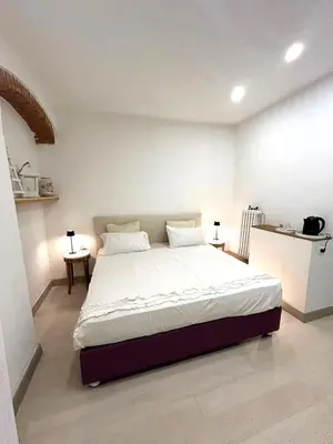 Letto o letti in una camera di Family and view