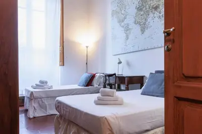 Letto o letti in una camera di Spartaco Prestigious Apartment