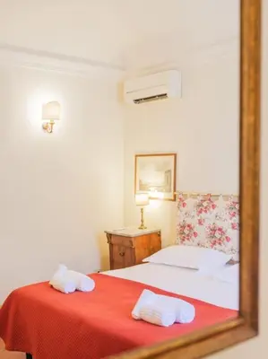 Letto o letti in una camera di Residenza Ardengo - Renaissance palace near Duomo