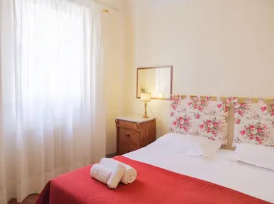 Letto o letti in una camera di Residenza Ardengo - Renaissance palace near Duomo