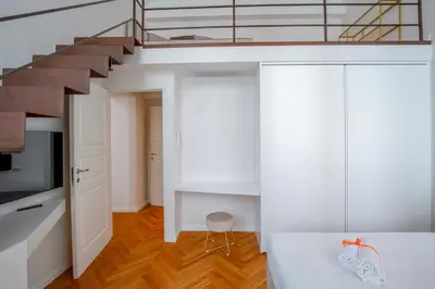 Letto o letti in una camera di Margherita Florence Apartament