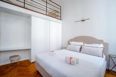 Letto o letti in una camera di Margherita Florence Apartament