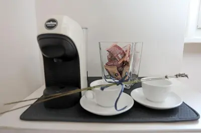 Set per la preparazione di tè e caffè presso Appartamento San Donato