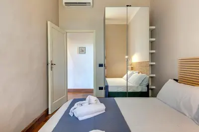 Letto o letti in una camera di Ridolfi Apartment by Mamo Florence