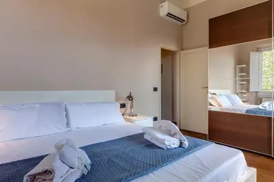 Letto o letti in una camera di Ridolfi Apartment by Mamo Florence