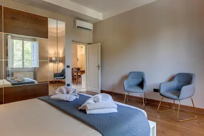 Letto o letti in una camera di Ridolfi Apartment by Mamo Florence