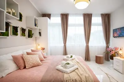 Letto o letti in una camera di Lux center, 2camere, 2bagni, train station SMN
